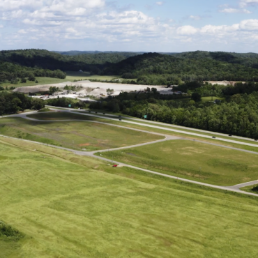 aerial view of property next to a major highway